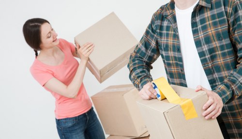Removal team planning a move in Shadwell near local flats and streets