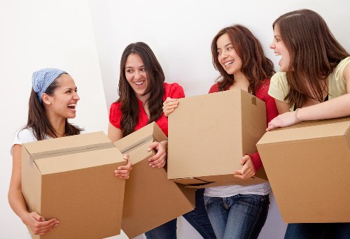 Professional movers handling furniture for a residential move in Shadwell