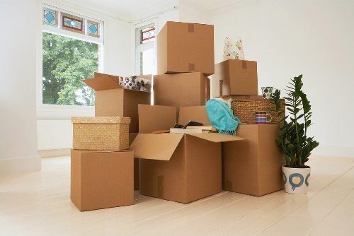 Packed moving boxes loaded into a removals van for a local Shadwell move